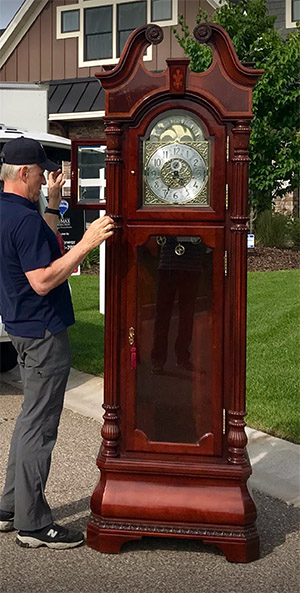 A Howard Miller Grandfather Clock after we repair it